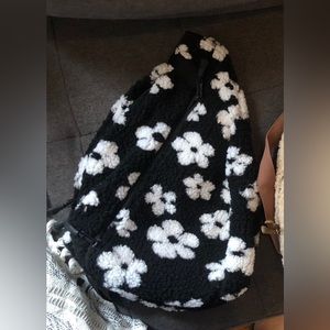 Black and white fuzzy sling back